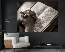 praying hands over a bible by Jörg B. Schubert on canvas, poster